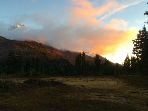Sunset next to a Mountain